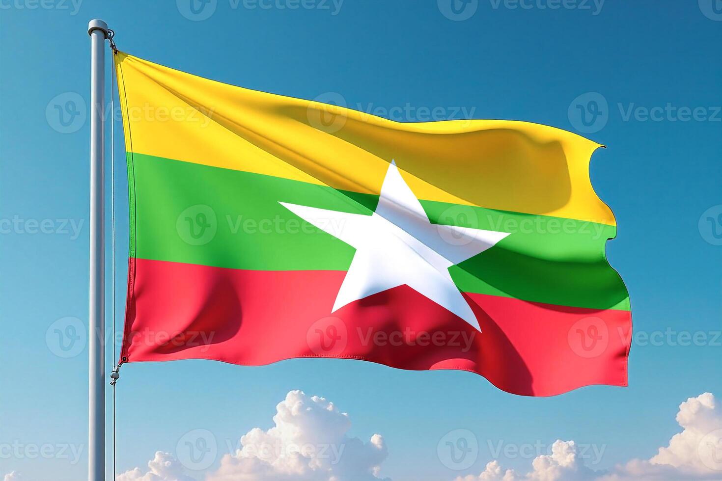 Myanmar Flag Waving Against Clear Blue Sky photo