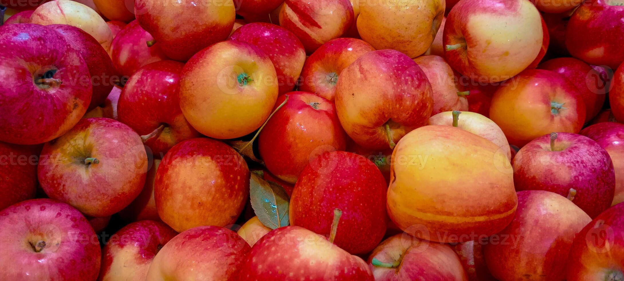Box of shiny red apples photo