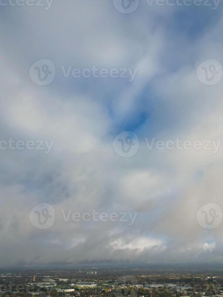 Aerial View of Manchester City During Autumn Season and Cloudy Day over England Great Britain. High Angle Drone's Camera Footage was Captured on October 29th, 2024 photo
