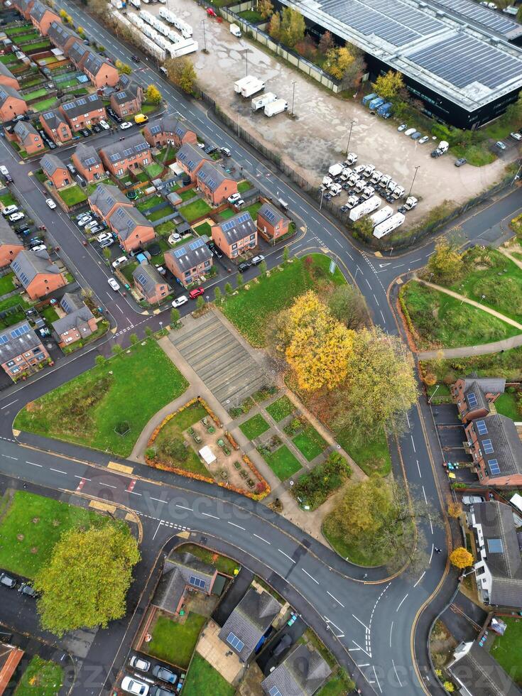 Aerial View of Manchester City During Autumn Season and Cloudy Day over England Great Britain. High Angle Drone's Camera Footage was Captured on October 29th, 2024 photo