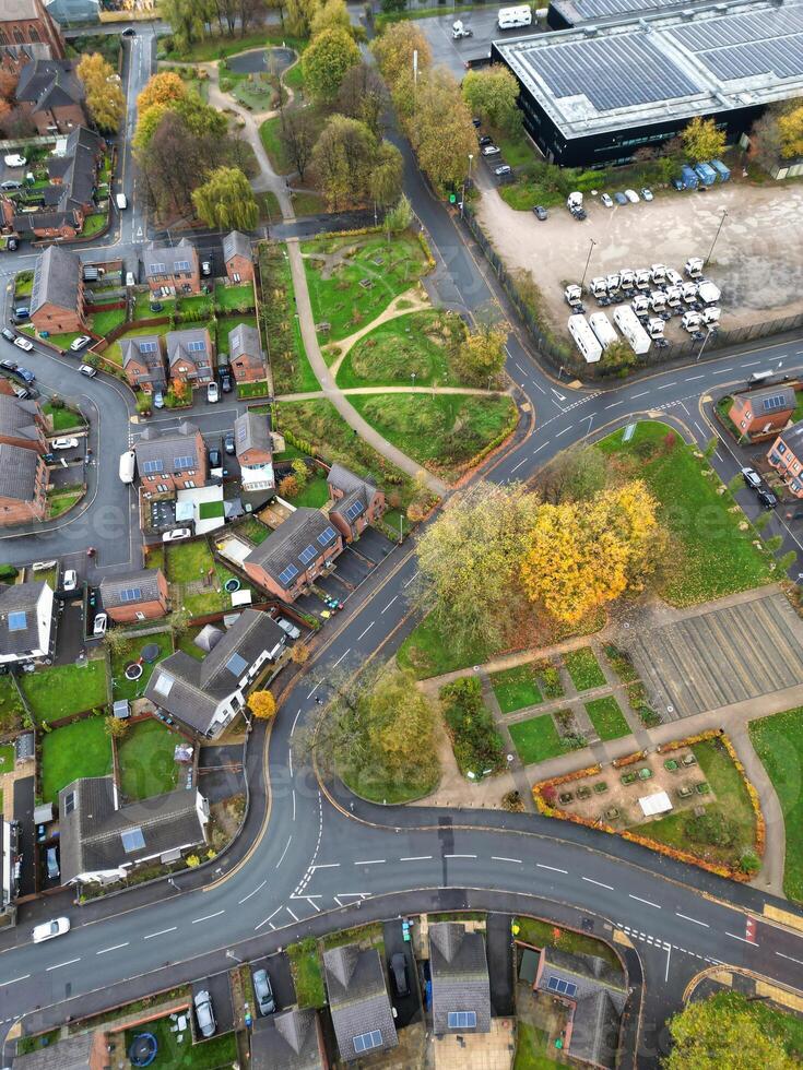 Aerial View of Manchester City During Autumn Season and Cloudy Day over England Great Britain. High Angle Drone's Camera Footage was Captured on October 29th, 2024 photo