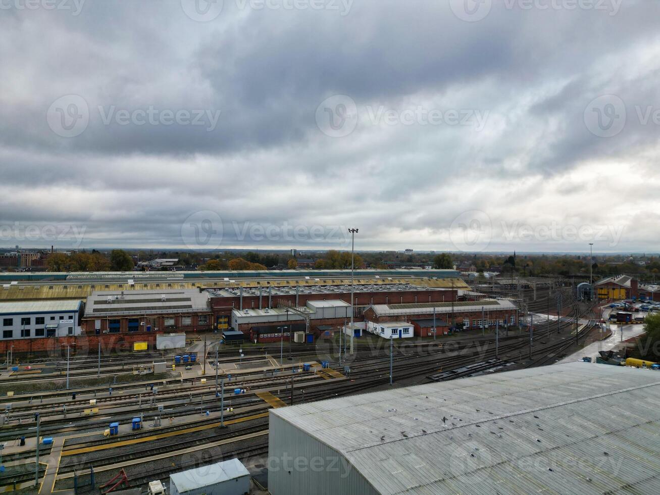 Aerial View of Manchester City During Autumn Season and Cloudy Day over England Great Britain. High Angle Drone's Camera Footage was Captured on October 29th, 2024 photo