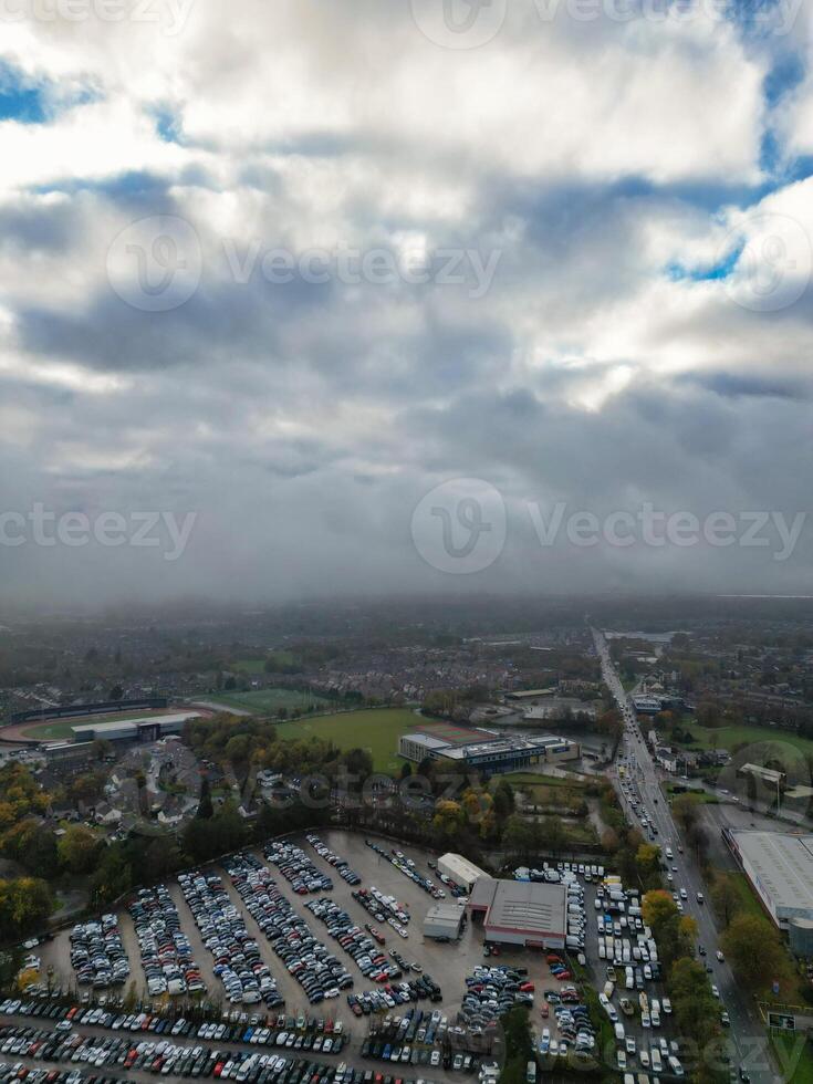 Aerial View of Manchester City During Autumn Season and Cloudy Day over England Great Britain. High Angle Drone's Camera Footage was Captured on October 29th, 2024 photo