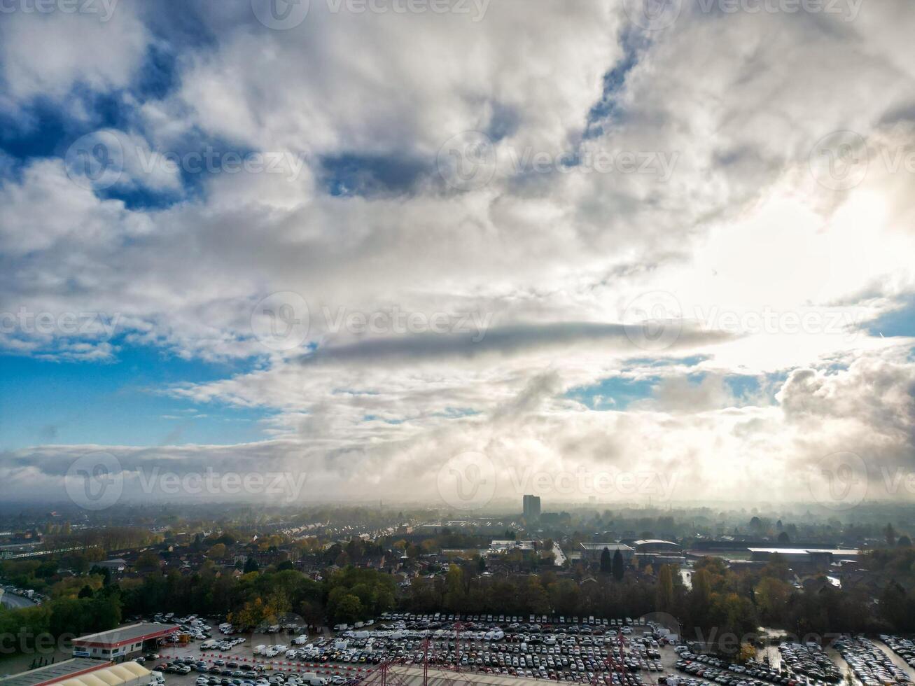Aerial View of Manchester City During Autumn Season and Cloudy Day over England Great Britain. High Angle Drone's Camera Footage was Captured on October 29th, 2024 photo