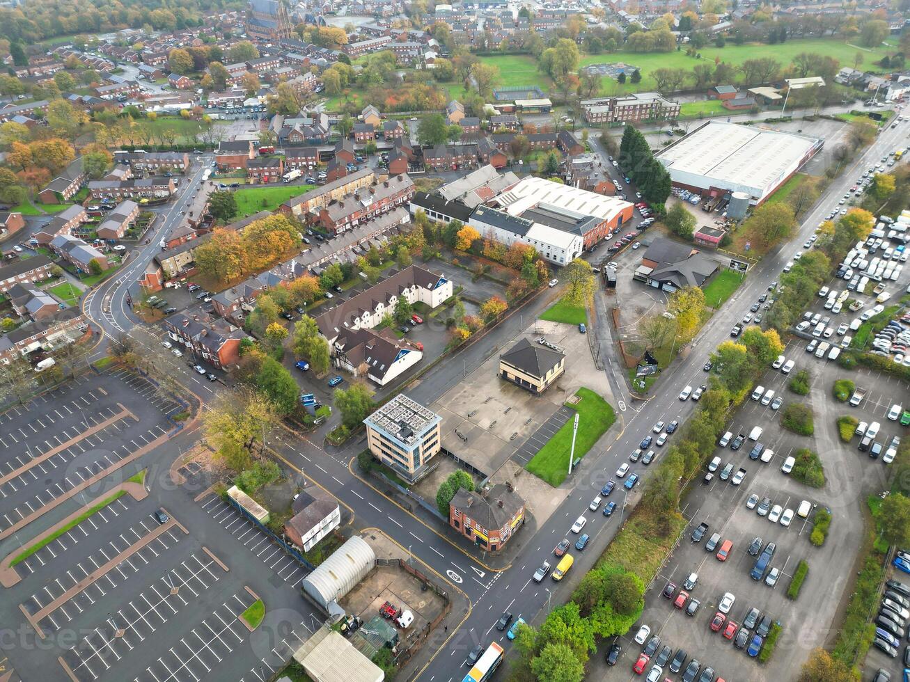 Aerial View of Manchester City During Autumn Season and Cloudy Day over England Great Britain. High Angle Drone's Camera Footage was Captured on October 29th, 2024 photo