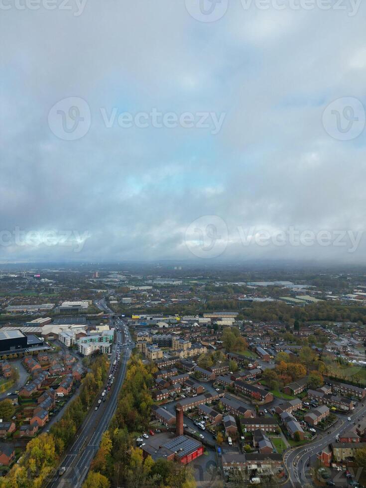 Aerial View of Manchester City During Autumn Season and Cloudy Day over England Great Britain. High Angle Drone's Camera Footage was Captured on October 29th, 2024 photo