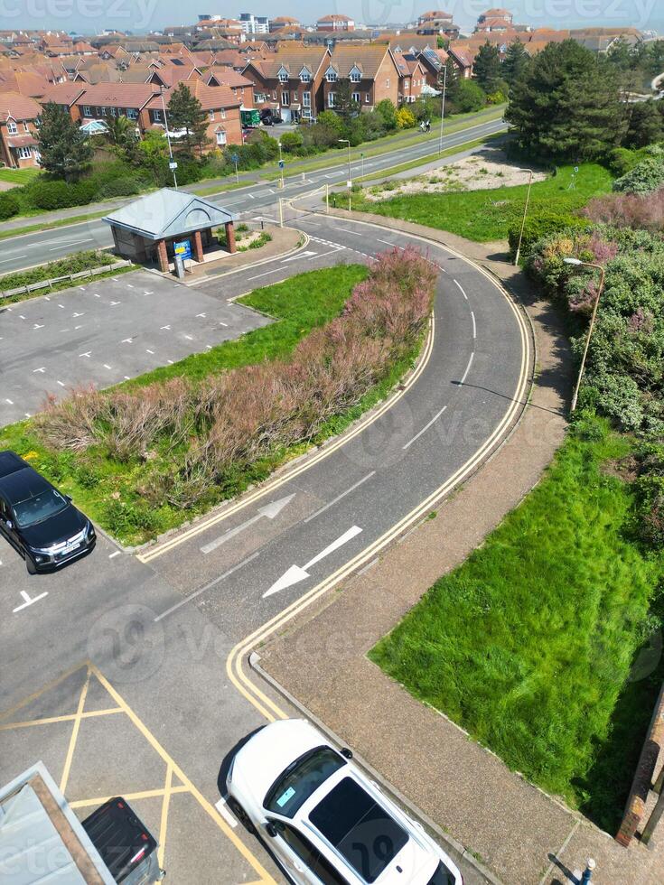 High Angle View of Historical Central Eastbourne Buildings and City of England, United Kingdom. Aerial Footage Was Captured with Drone's Camera During Windy Day on May 11th, 2024 photo