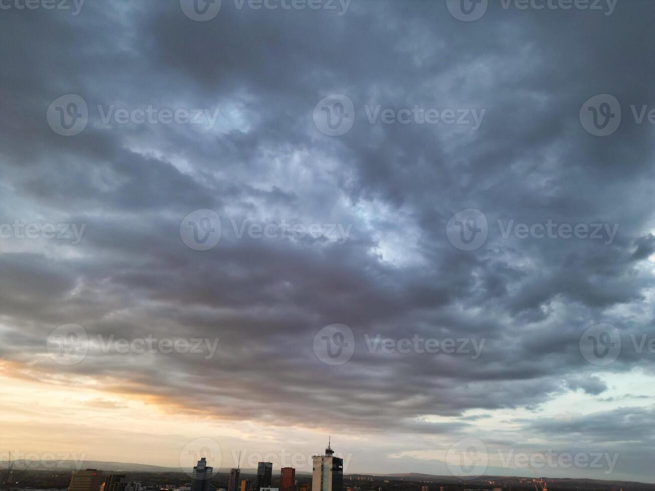 Unique and Dramatic Clouds and Sky over City of England Great Britain. Footage Was Captured with drone's Camera from High Altitude over Manchester City UK photo