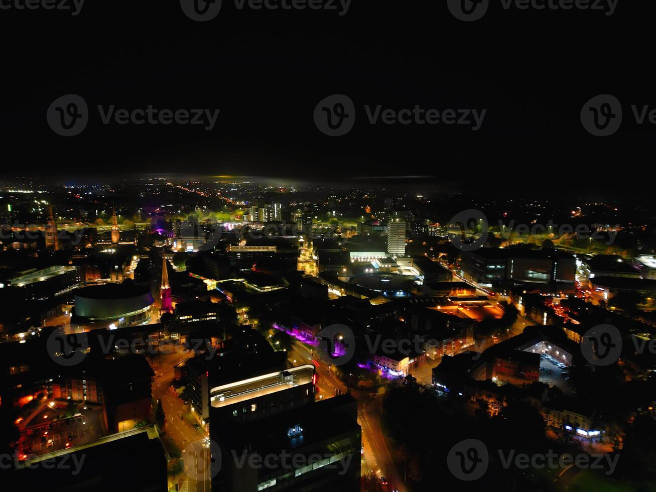Aerial View of Illuminated Historical Central Coventry City Centre Downtown of England United Kingdom. Night view Captured on After Midnight with Drone's Camera on October 23rd, 2024 photo