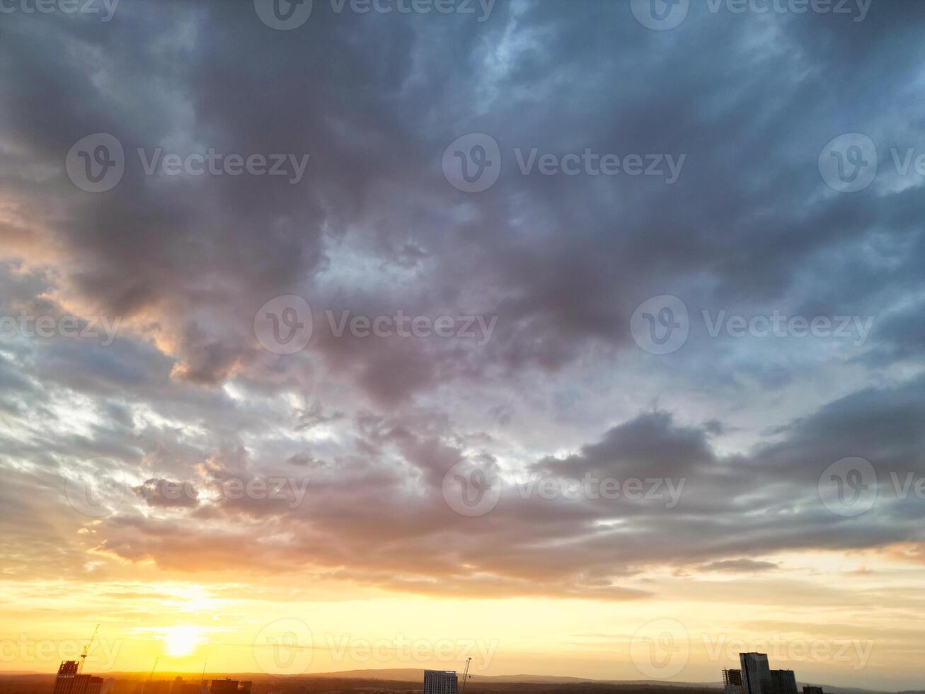 Unique and Dramatic Clouds and Sky over City of England Great Britain. Footage Was Captured with drone's Camera from High Altitude over Manchester City UK photo