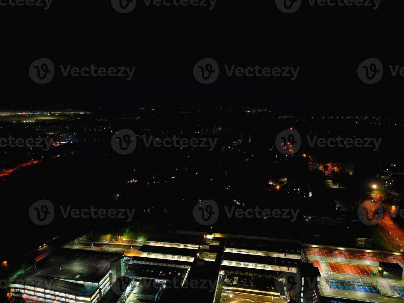 Aerial View of Illuminated Historical Central Coventry City Centre Downtown of England United Kingdom. Night view Captured on After Midnight with Drone's Camera on October 23rd, 2024 photo
