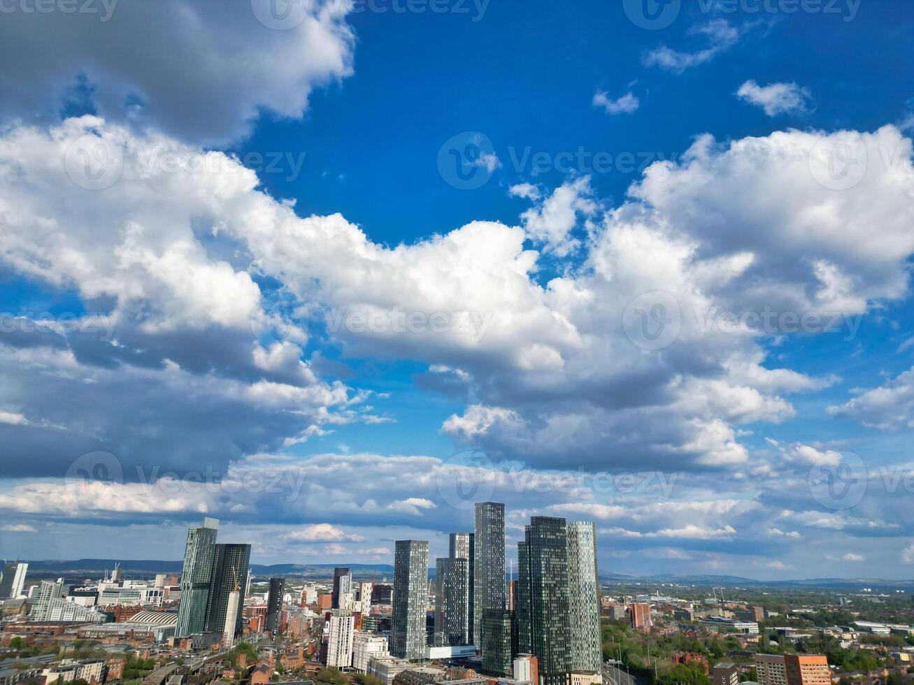 Aerial View of Greater Manchester City Centre and Tall Buildings During Golden Hour of Sunset. England UK. May 5th, 2024, High Angle Footage Was Captured with Drone's Camera photo