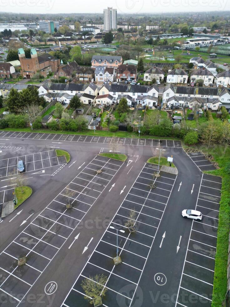 high Angle View of Buildings at Central Borehamwood London City of England United Kingdom. April 4th, 2024, Aerial View Was Captured with Drone's Camera From High altitude During Cloudy and Windy Day. photo
