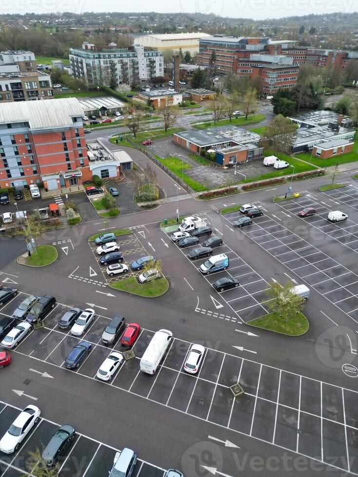high Angle View of Buildings at Central Borehamwood London City of England United Kingdom. April 4th, 2024, Aerial View Was Captured with Drone's Camera From High altitude During Cloudy and Windy Day. photo