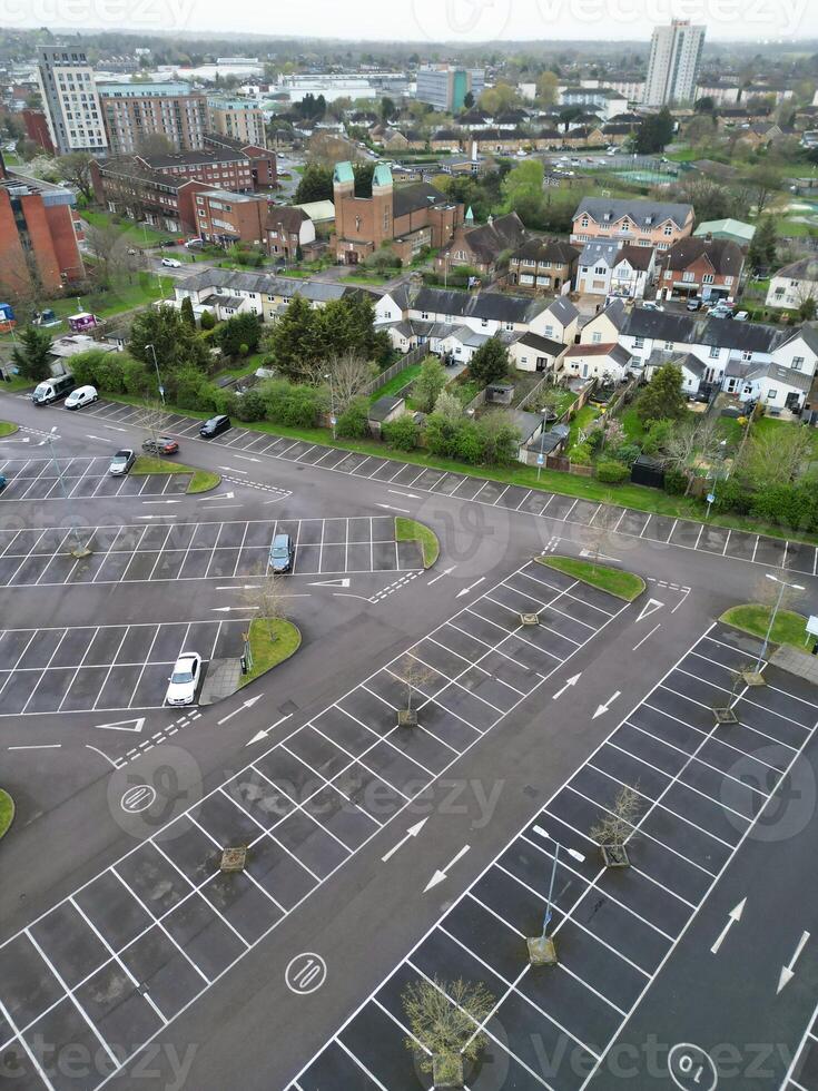 high Angle View of Buildings at Central Borehamwood London City of England United Kingdom. April 4th, 2024, Aerial View Was Captured with Drone's Camera From High altitude During Cloudy and Windy Day. photo