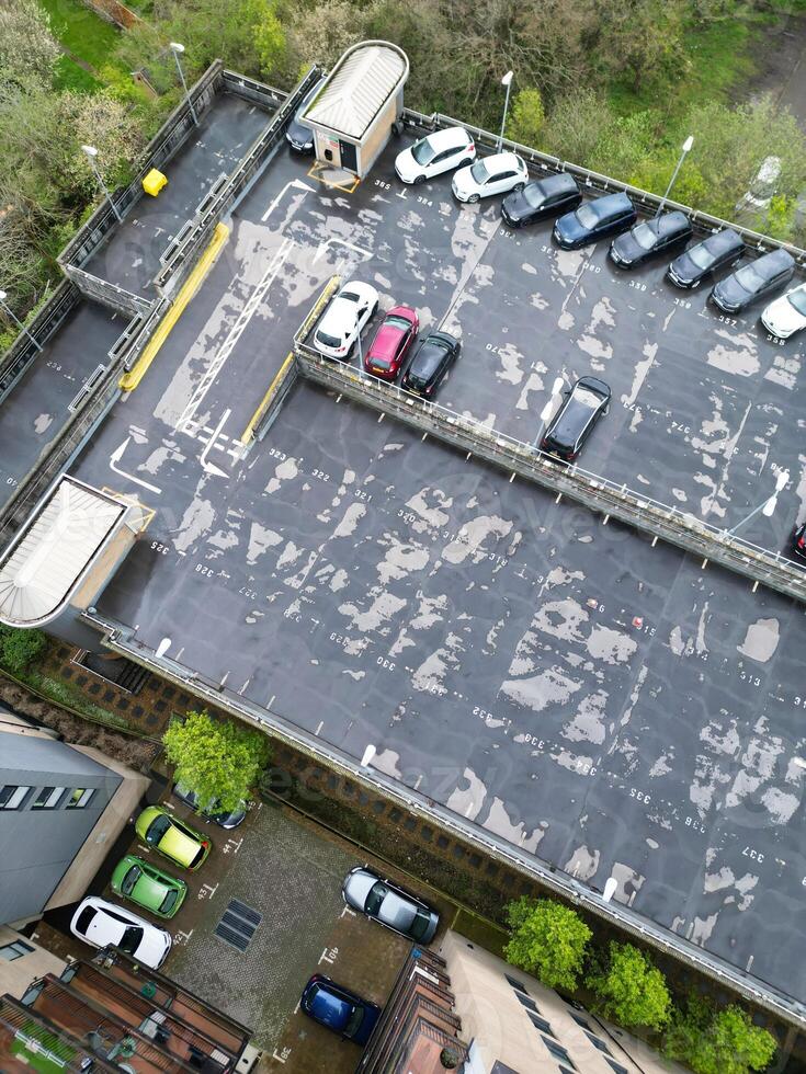 high Angle View of Buildings at Central Borehamwood London City of England United Kingdom. April 4th, 2024, Aerial View Was Captured with Drone's Camera From High altitude During Cloudy and Windy Day. photo