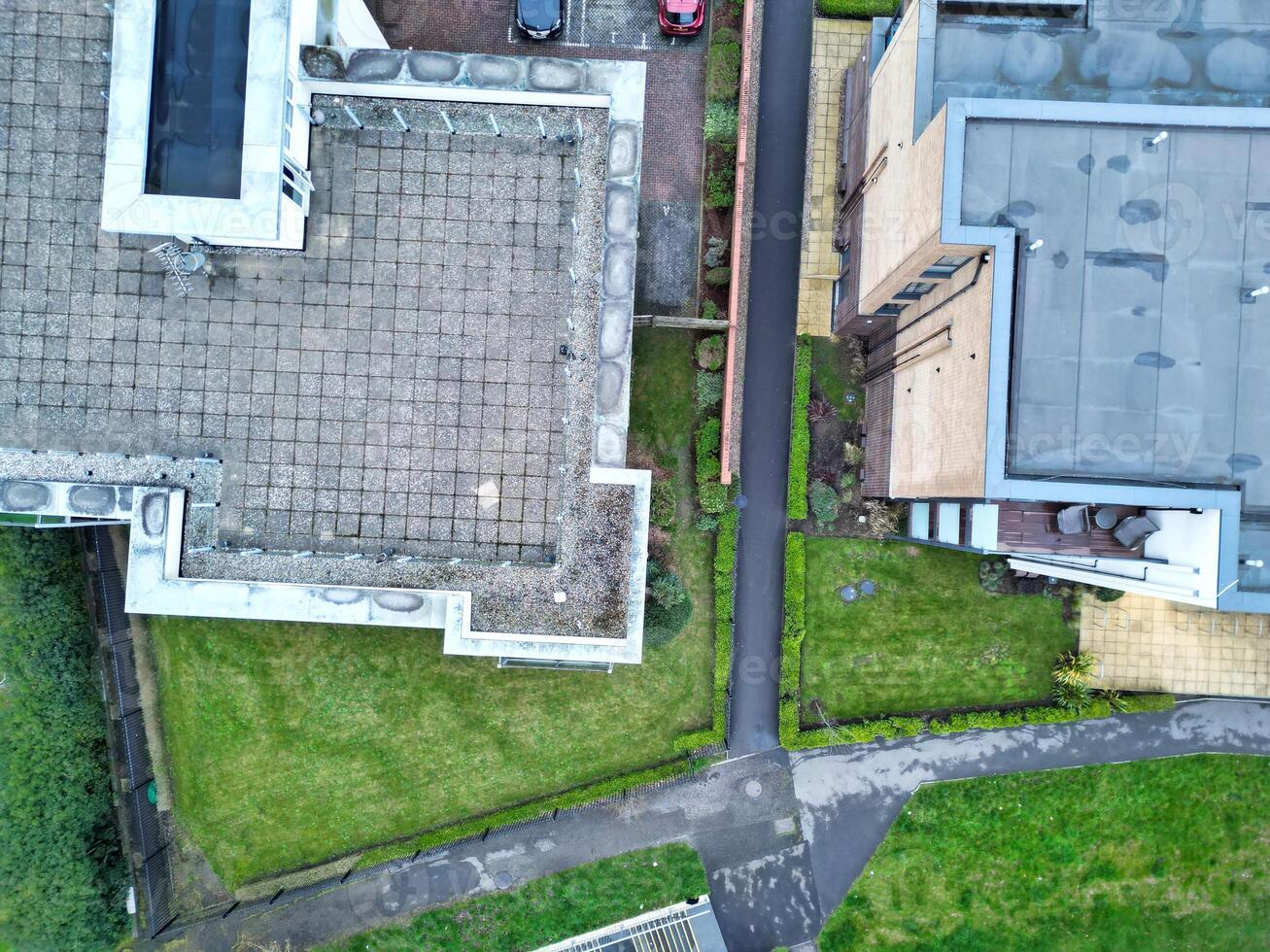 high Angle View of Buildings at Central Borehamwood London City of England United Kingdom. April 4th, 2024, Aerial View Was Captured with Drone's Camera From High altitude During Cloudy and Windy Day. photo