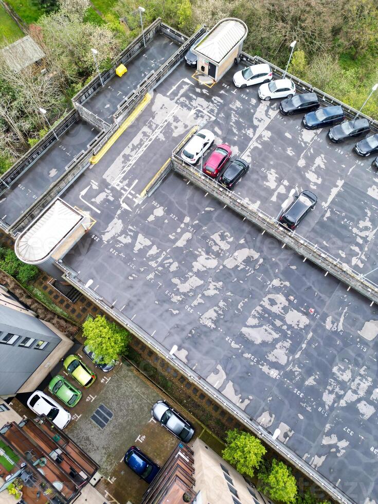 high Angle View of Buildings at Central Borehamwood London City of England United Kingdom. April 4th, 2024, Aerial View Was Captured with Drone's Camera From High altitude During Cloudy and Windy Day. photo
