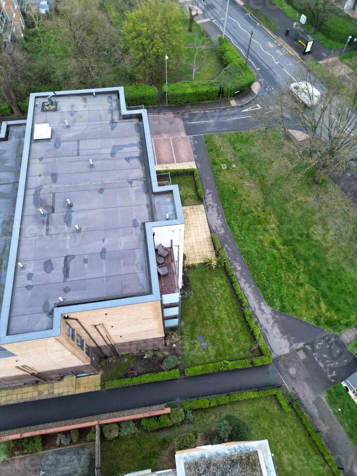 high Angle View of Buildings at Central Borehamwood London City of England United Kingdom. April 4th, 2024, Aerial View Was Captured with Drone's Camera From High altitude During Cloudy and Windy Day. photo