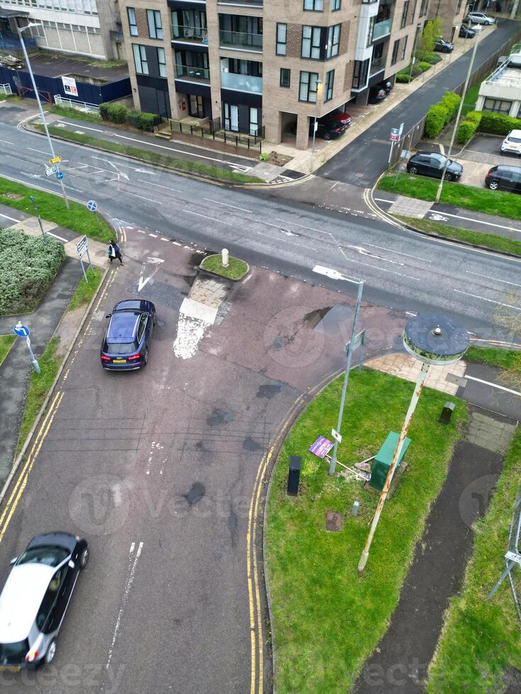 high Angle View of Buildings at Central Borehamwood London City of England United Kingdom. April 4th, 2024, Aerial View Was Captured with Drone's Camera From High altitude During Cloudy and Windy Day. photo