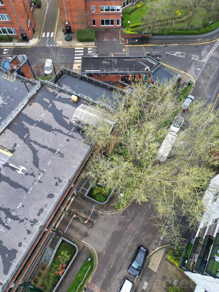 high Angle View of Buildings at Central Borehamwood London City of England United Kingdom. April 4th, 2024, Aerial View Was Captured with Drone's Camera From High altitude During Cloudy and Windy Day. photo