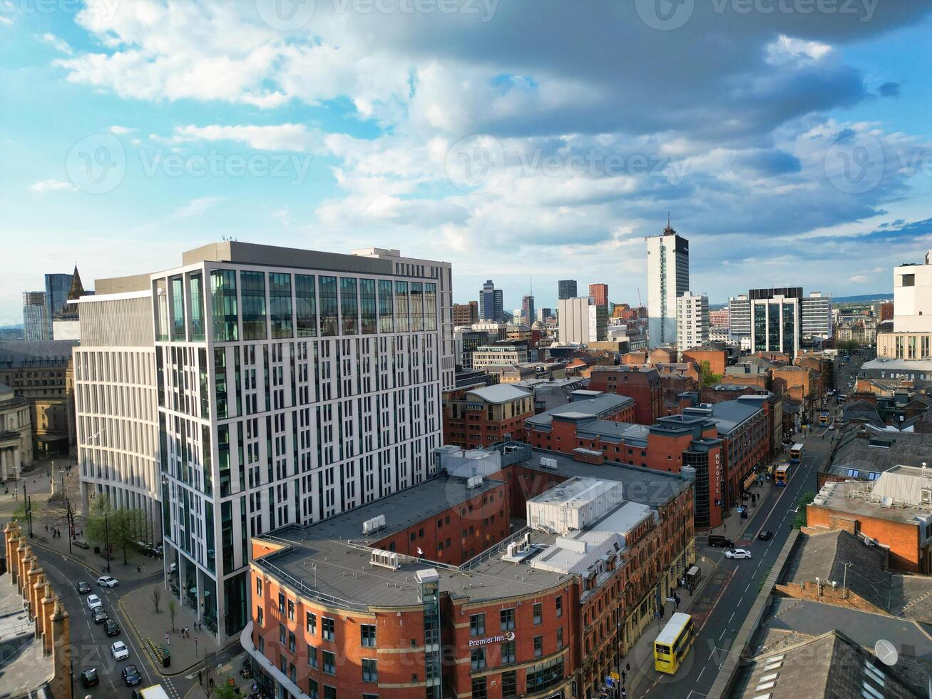 Aerial View of Greater Manchester City Centre and Tall Buildings During Golden Hour of Sunset. England UK. May 5th, 2024, High Angle Footage Was Captured with Drone's Camera photo