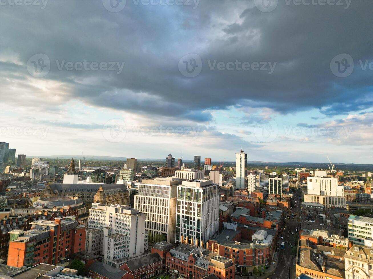 Aerial View of Greater Manchester City Centre and Tall Buildings During Golden Hour of Sunset. England UK. May 5th, 2024, High Angle Footage Was Captured with Drone's Camera photo