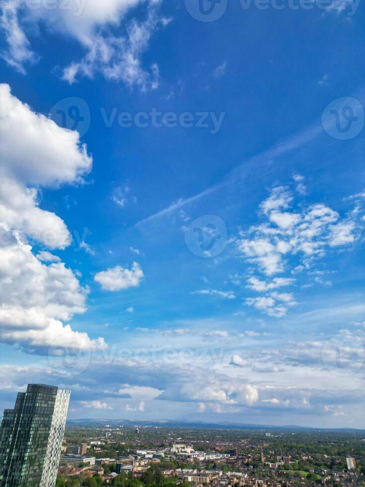 Aerial View of Greater Manchester City Centre and Tall Buildings During Golden Hour of Sunset. England UK. May 5th, 2024, High Angle Footage Was Captured with Drone's Camera photo