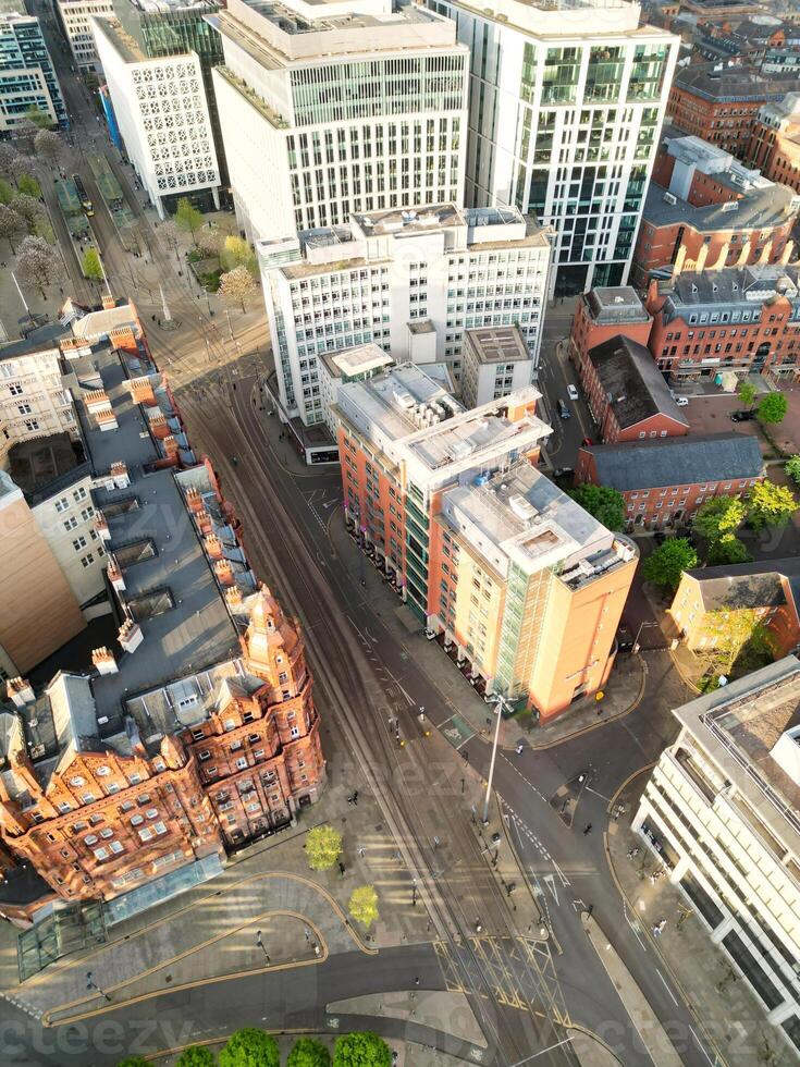 Aerial View of Greater Manchester City Centre and Tall Buildings During Golden Hour of Sunset. England UK. May 5th, 2024, High Angle Footage Was Captured with Drone's Camera photo