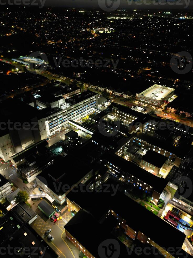 Most Beautiful High Angle View of Illuminated Luton City of England UK at Just After Sunset and Full Moon Night. Aerial Footage Was Captured with Drone's Camera on October 17th, 2024 photo