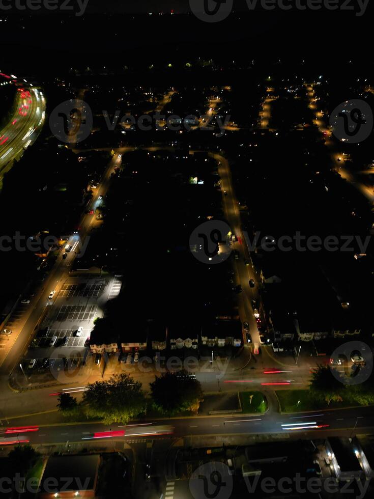 Most Beautiful High Angle View of Illuminated Luton City of England UK at Just After Sunset and Full Moon Night. Aerial Footage Was Captured with Drone's Camera on October 17th, 2024 photo