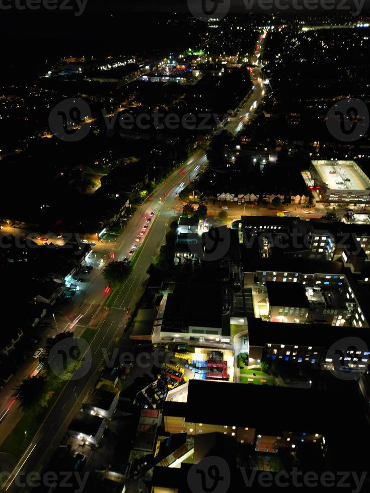 Most Beautiful High Angle View of Illuminated Luton City of England UK at Just After Sunset and Full Moon Night. Aerial Footage Was Captured with Drone's Camera on October 17th, 2024 photo
