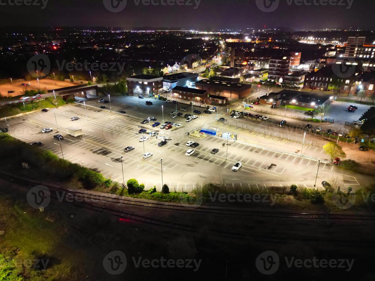 Aerial View of Illuminated Central Bedford City of England United Kingdom During Night. April 5th, 2024, High Angle Footage Was Captured after Sunset and Beginning of Night with Drone's Camera photo