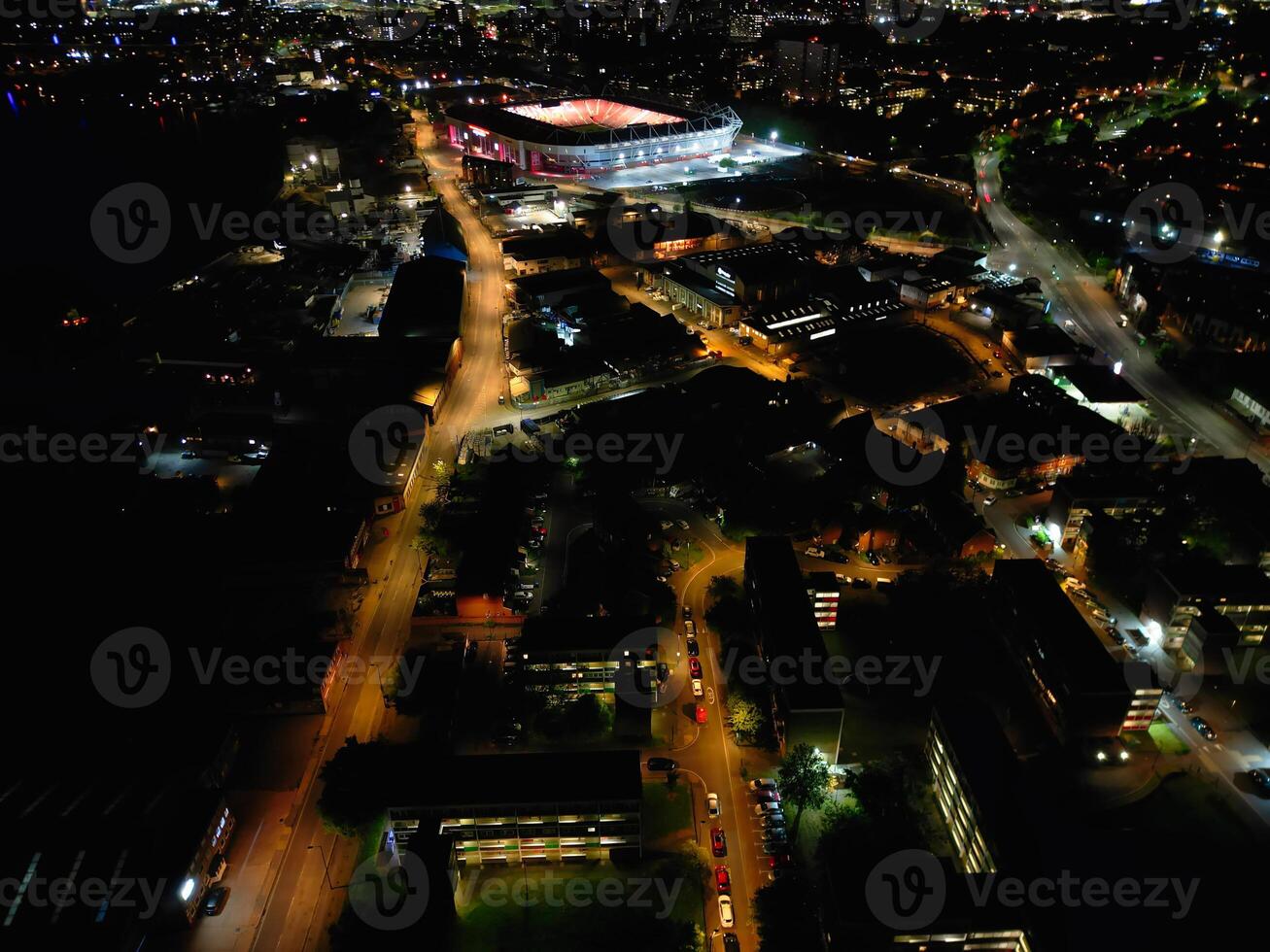 Aerial View of Illuminated Southampton Docks and Port City Centre During Dark Night. England United Kingdom. High Angle Drone's Camera Footage Captured from High Altitude on May 16th, 2024 photo