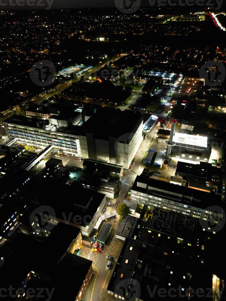 Most Beautiful High Angle View of Illuminated Luton City of England UK at Just After Sunset and Full Moon Night. Aerial Footage Was Captured with Drone's Camera on October 17th, 2024 photo