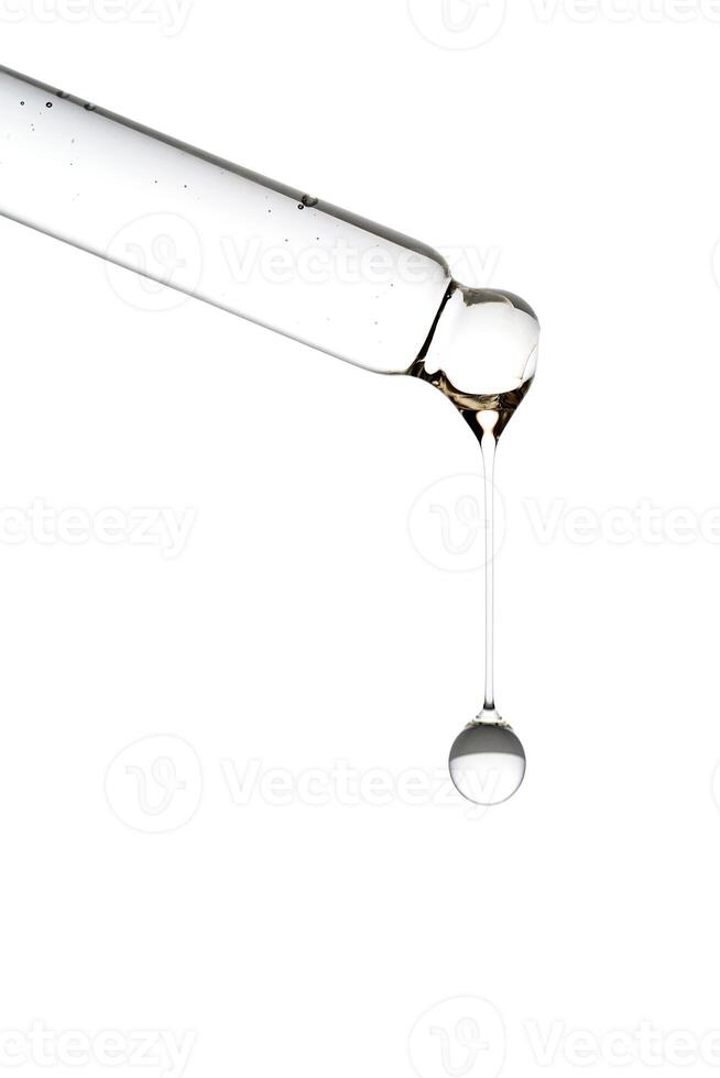 Dropper pipette with delicious serum with bubbles close-up. photo