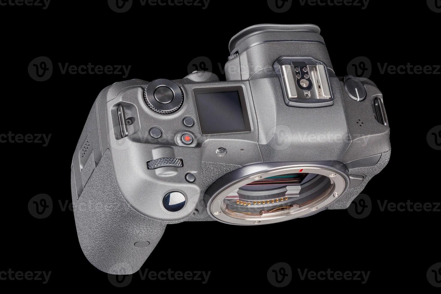 black professional mirrorless camera body isolated on black background photo