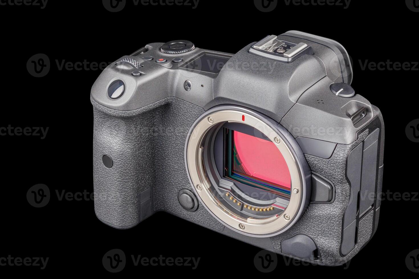 black professional mirrorless camera body isolated on black background photo