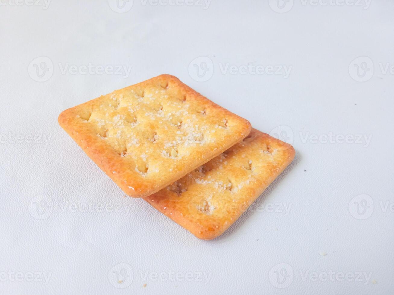 Sugar coated biscuits, also known as malkist, sweet and crispy. isolate on white. snack concept photo