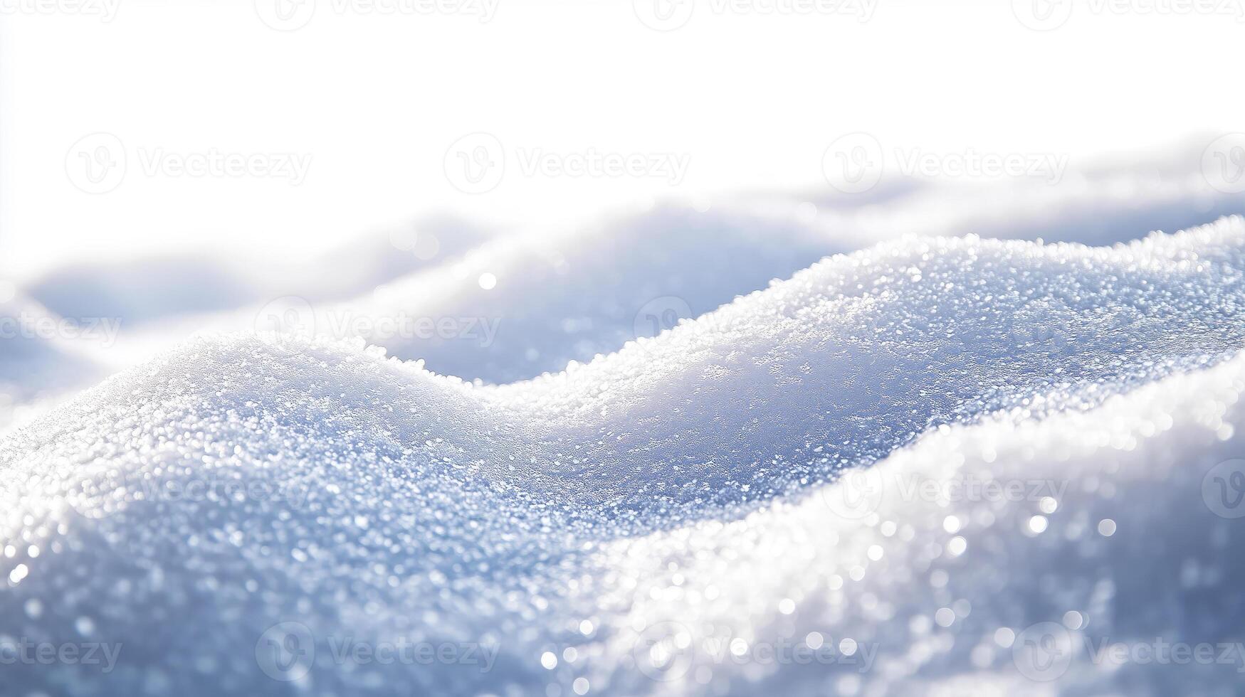 A snowy mountain range with a snow covered hill photo