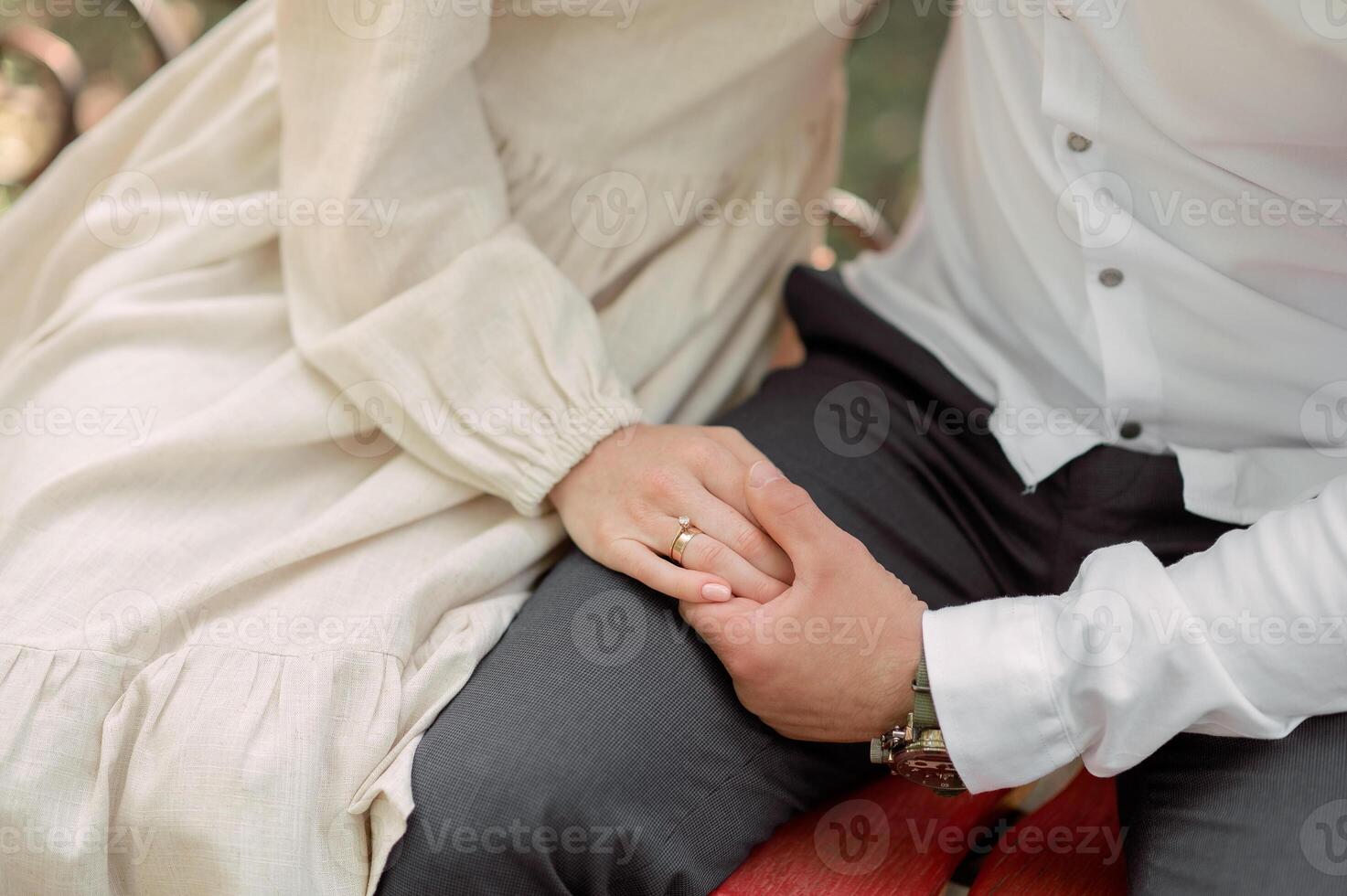Bride and groom Newlyweds touch hands each other on wedding. A very subtle line trust. Relations between a man and a woman. The concept of love and romantic photo