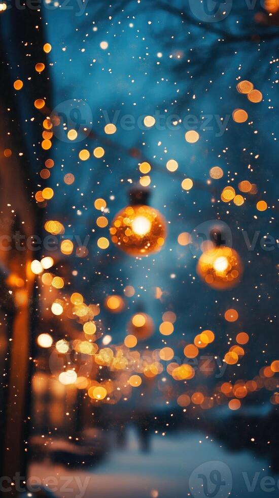 Christmas background Winter abstract Backdrop. Snow is falling and warm orange lights are shining. For a greeting card, invitation with place for text Vertical picture stories photo