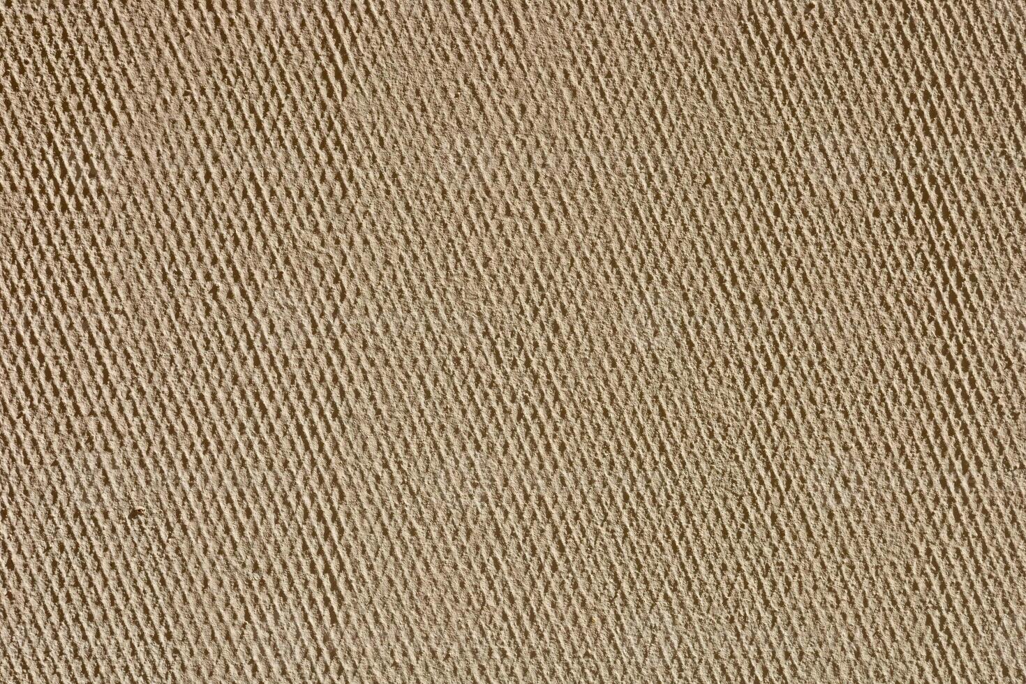 Textured fabric background in neutral tones showcasing fine woven patterns and details photo