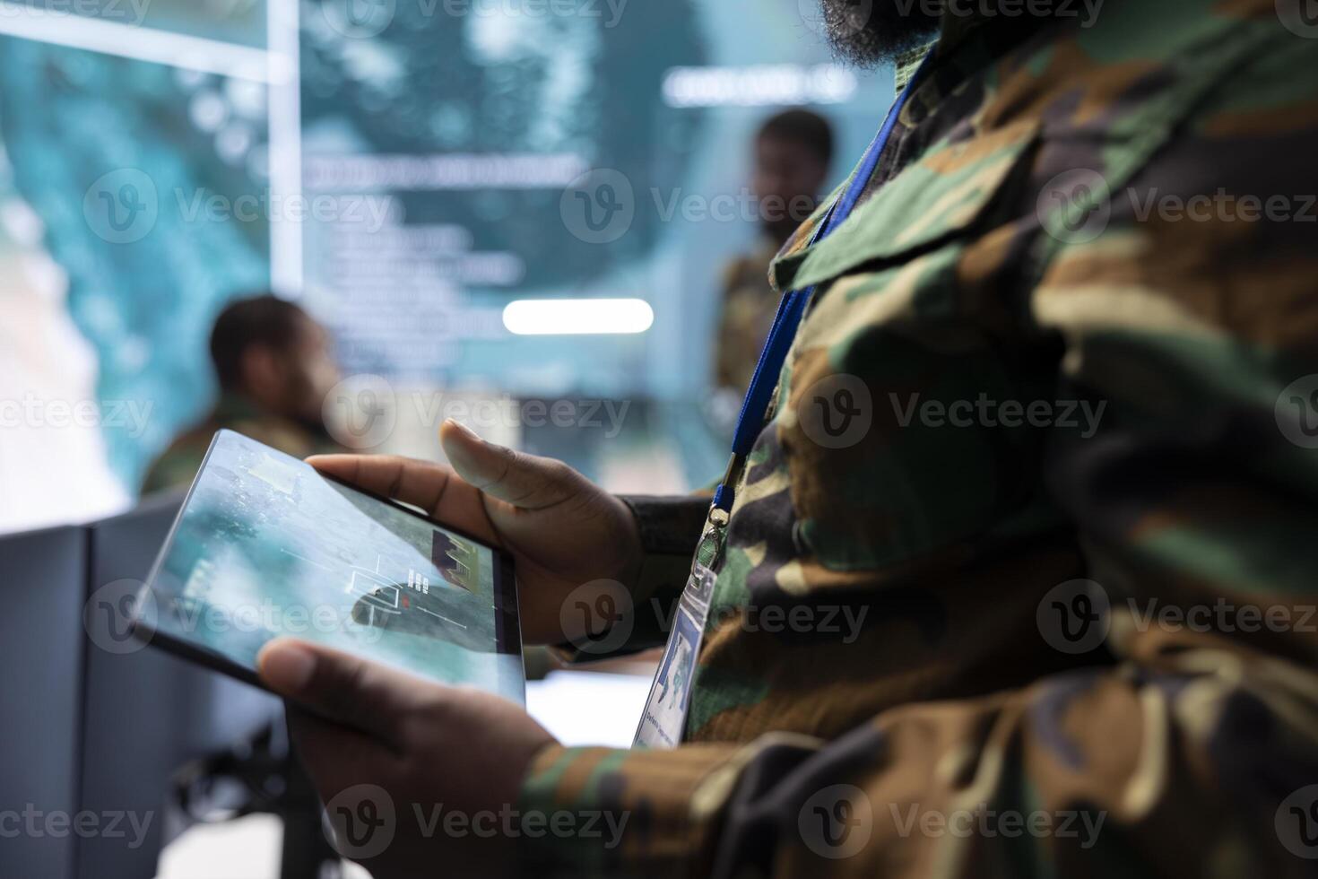 High tech military office with soldiers analyzing real time data, processing intelligence information and coordinating strategic operations to support military missions effectively. photo