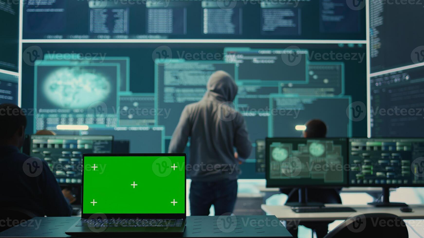 Isolated copy space running on a laptop in high tech agency office, governmental hackers analyzing digital threats on big screens. Working on cybercrime and protection against phishing. Camera B. photo