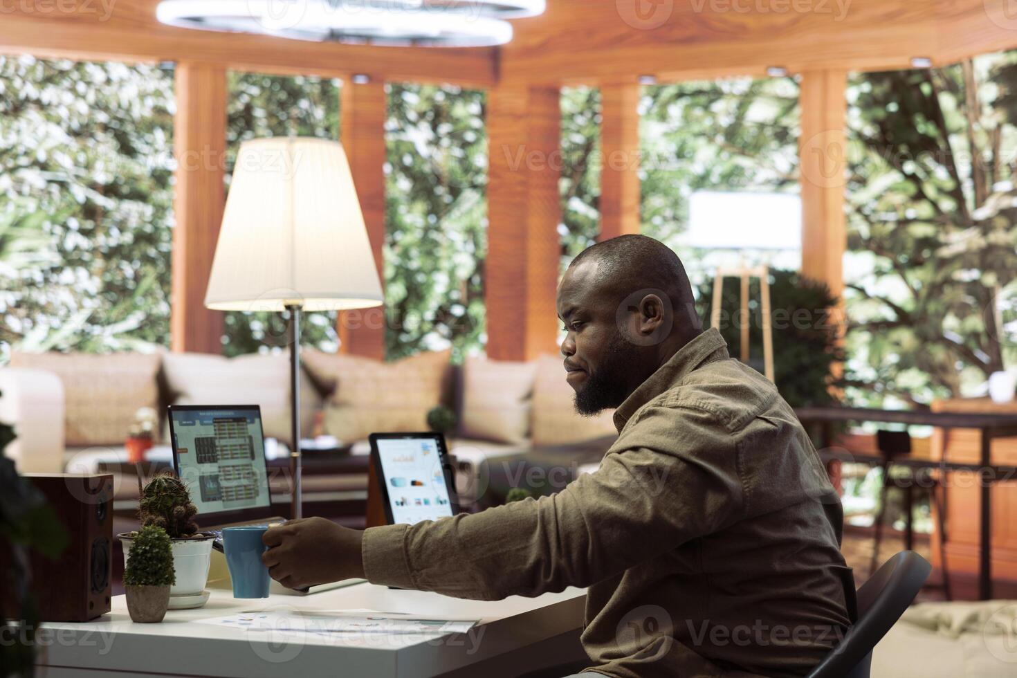 General manager working on data and money management with infographics and business activity reports, accomplishing expansion goals. Financial planning with account budget balance. photo