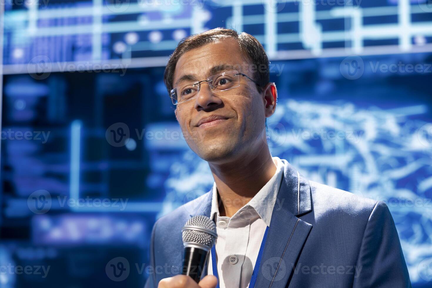 Speaker talking at tech conference, exploring latest AI technology trends, case studies, and use cases. IT expert presenting how artificial intelligence will shape the future during event photo