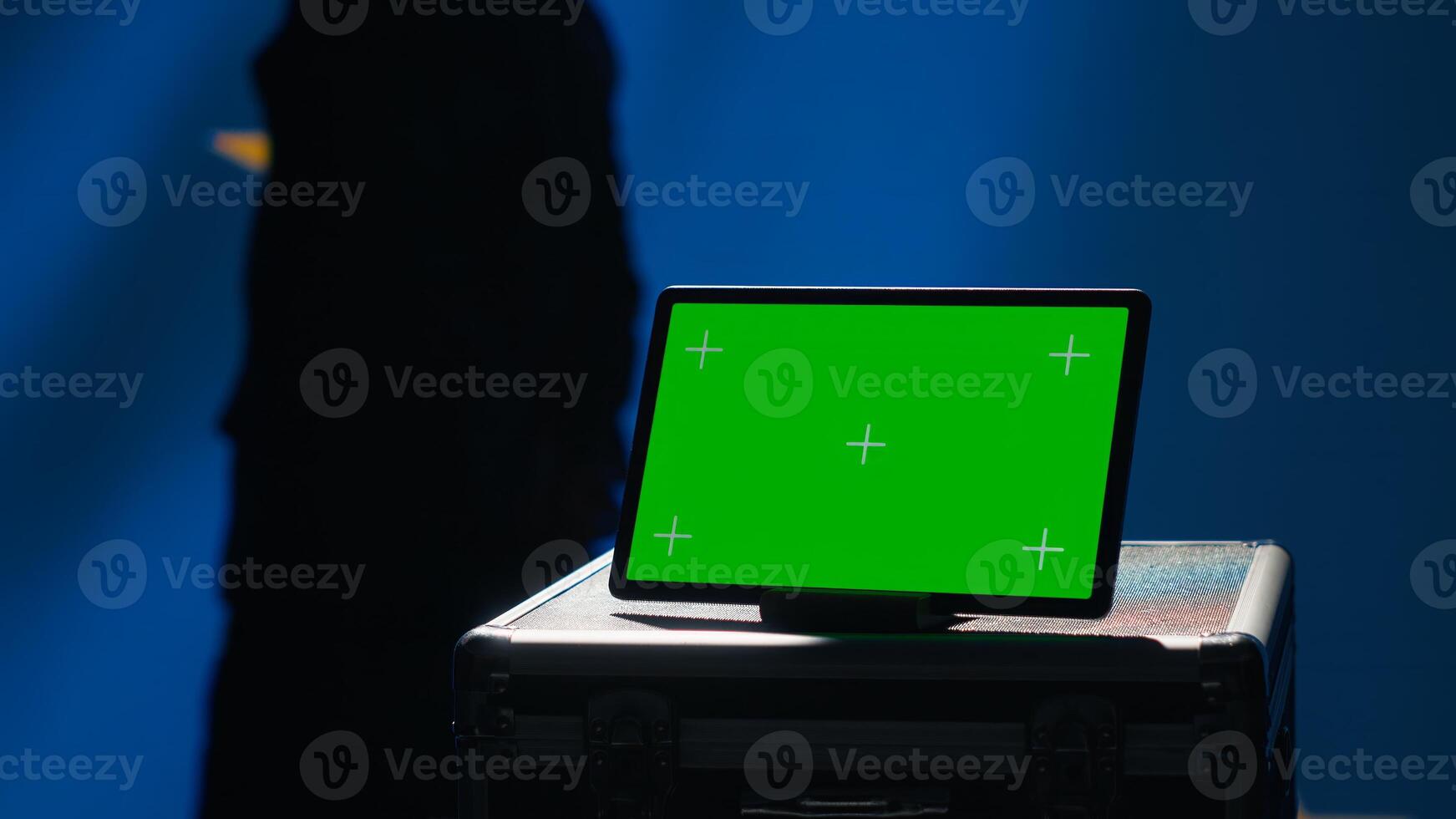 European Union agency operator using military tech on green screen tablet to identify threats from enemies. EU treaty security personnel using mockup device to relay info to war front lines, camera A photo