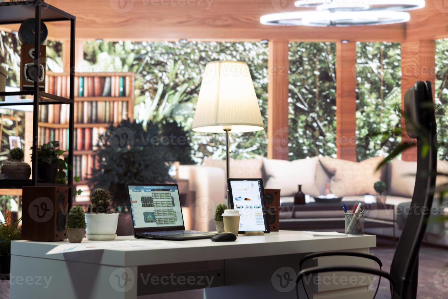 Empty home office belonging to a small business owner with data sales reports on laptop, annual information and invoices for accounting work. Finance and economy budget balance. photo