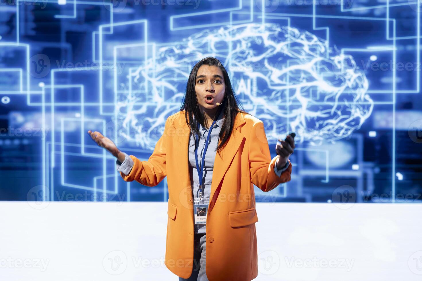 Engineer using mic during presentation, exploring ways emerging AI technologies can enhance businesses workforce. Data researcher at event presents strategies for using artificial intelligence photo